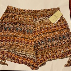 Rae Republic misses petite shorts color is rust boarder size PXL